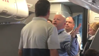 American Airlines Is Investigating the Flight Attendant Who Jeered At a Passenger to "Bring It On"